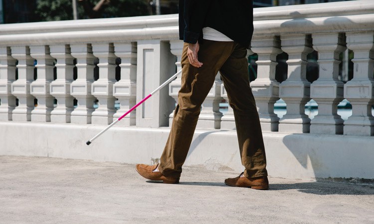 Photo: Deaf-Blind Person Walking