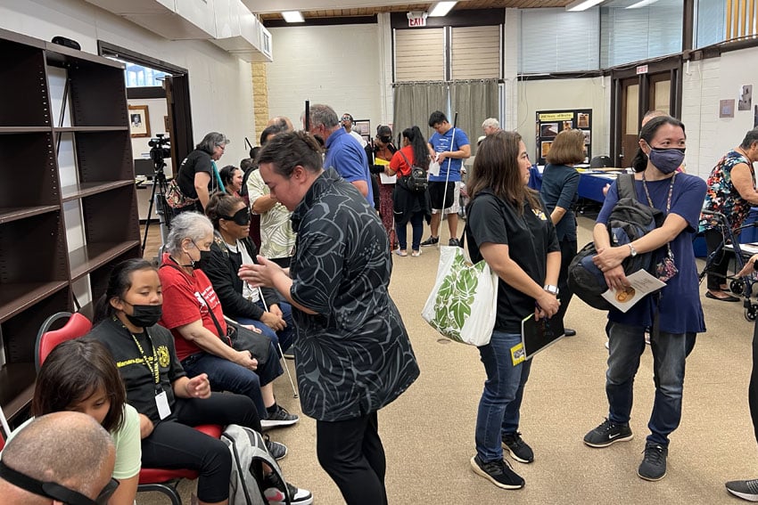 Photo: Participants gather at the Library for the Blind Braille Event