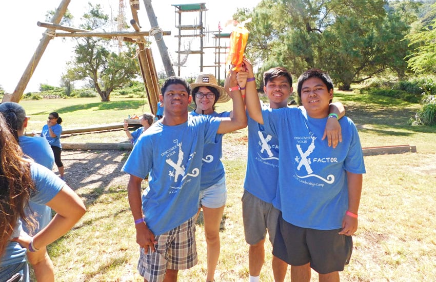 Photo: Camp participants holding a flag